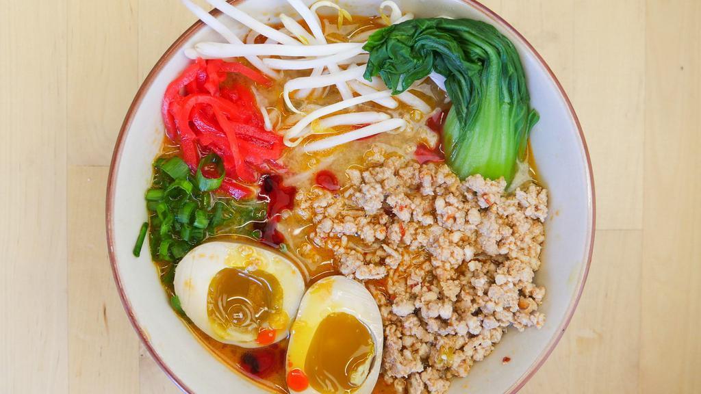 Tantanmen with Spicy Ground Pork · Spicy miso pork broth (contains sesame oil and past, peanut butter and chili oil) with spicy ground pork, soy-marinated egg, scallions, bok choy and medium noodles. Contains the following: gluten, peanuts, sesame, and soy.