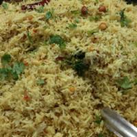 Saffron Rice · Long grained basmati rice with saffron.