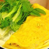Vietnamese Crepe / Bánh Xèo · Crispy eggless crêpe infused with a hint of turmeric, filled with shrimp, pork, onions, and ...