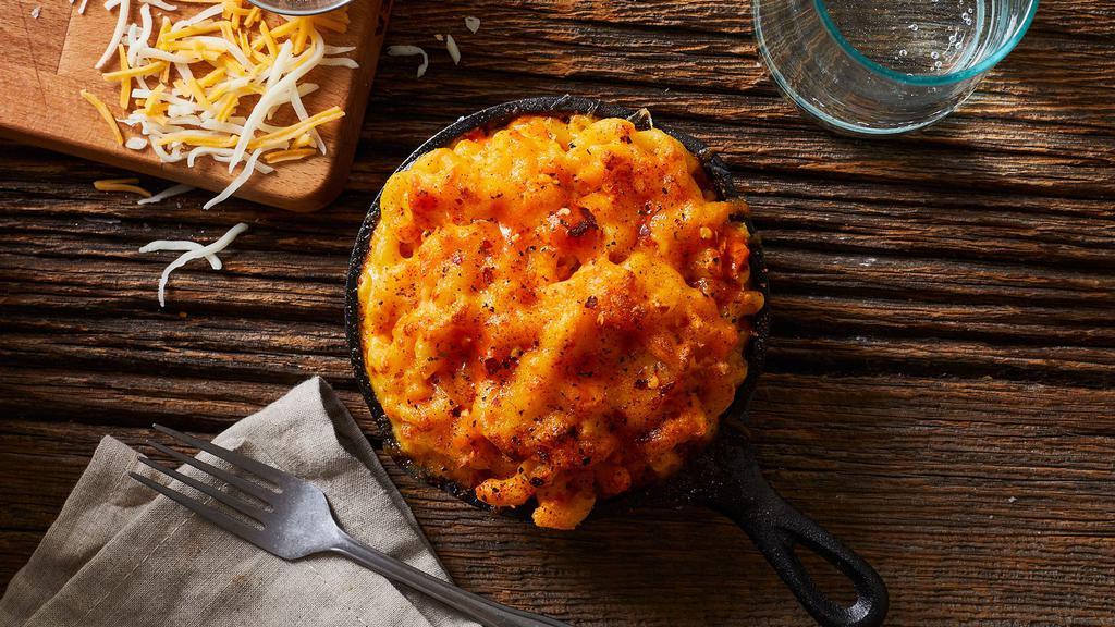 Spicy Mac And Cheese · Elbow macaroni with our classic cheese blend and a secret cajun blend.