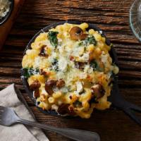 Spinach And Feta Mac And Cheese · Elbow macaroni with our classic cheese blend, spinach, feta, and greek olives.