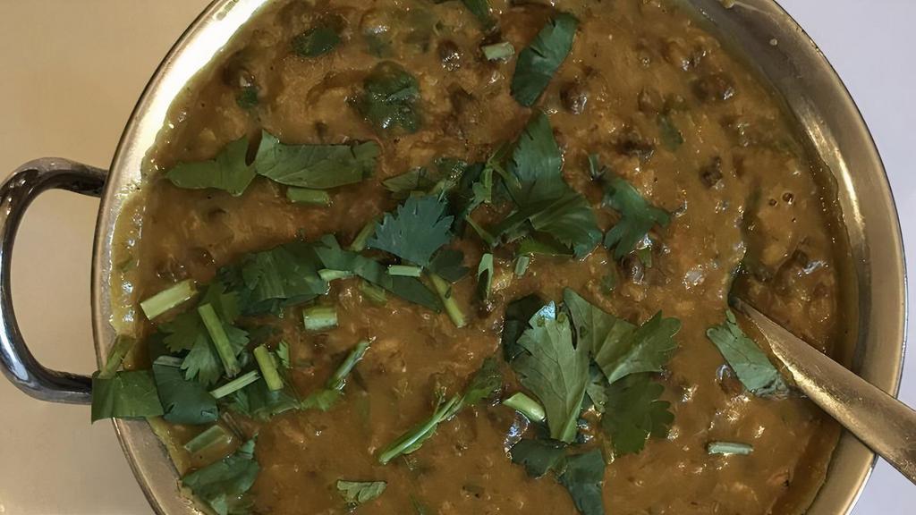 Daal Makhni · Black lentils & kidney beans, lentils sautéed with onions & tomatoes.