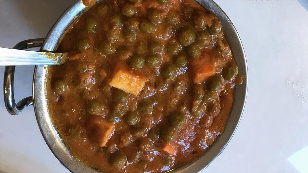 Mattar Paneer · Home made cheese & green peas in spiced gravy.