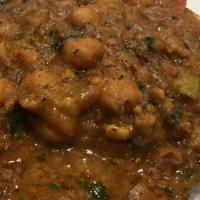 Chana Masala · Garbanzo beans in a special blend of spices.