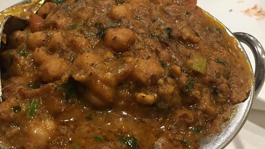 Chana Masala · Garbanzo beans in a special blend of spices.