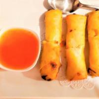 Thai Spring Roll · Crispy rolls stuffed with mixed vegetables, clear noodles served with sweet and sour sauce.