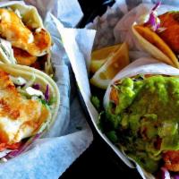 Pescado Taco · Gluten-free. Baja style fried fish in a corn tortilla with salsa, lime mayonnaise, cilantro,...
