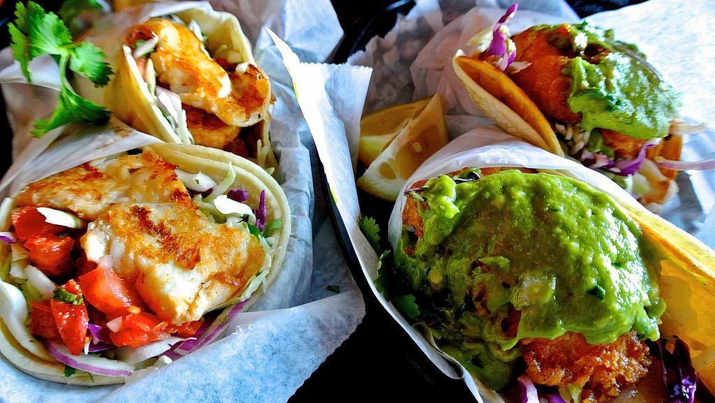 Pescado Taco · Gluten-free. Baja style fried fish in a corn tortilla with salsa, lime mayonnaise, cilantro, cabbage and onions.