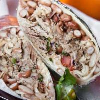 Carnitas Burrito · Braised shredded pork rolled in a flour tortilla with pico de gallo and pinto beans.