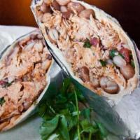Pollo Burrito · Seasoned, simmered chicken rolled in a flour tortilla with pico de gallo and pinto beans.