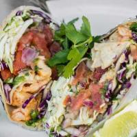 Camarones Burrito · Grilled tiger prawns rolled in a flour tortilla with tomatillo and pico de gallo salsas, cil...