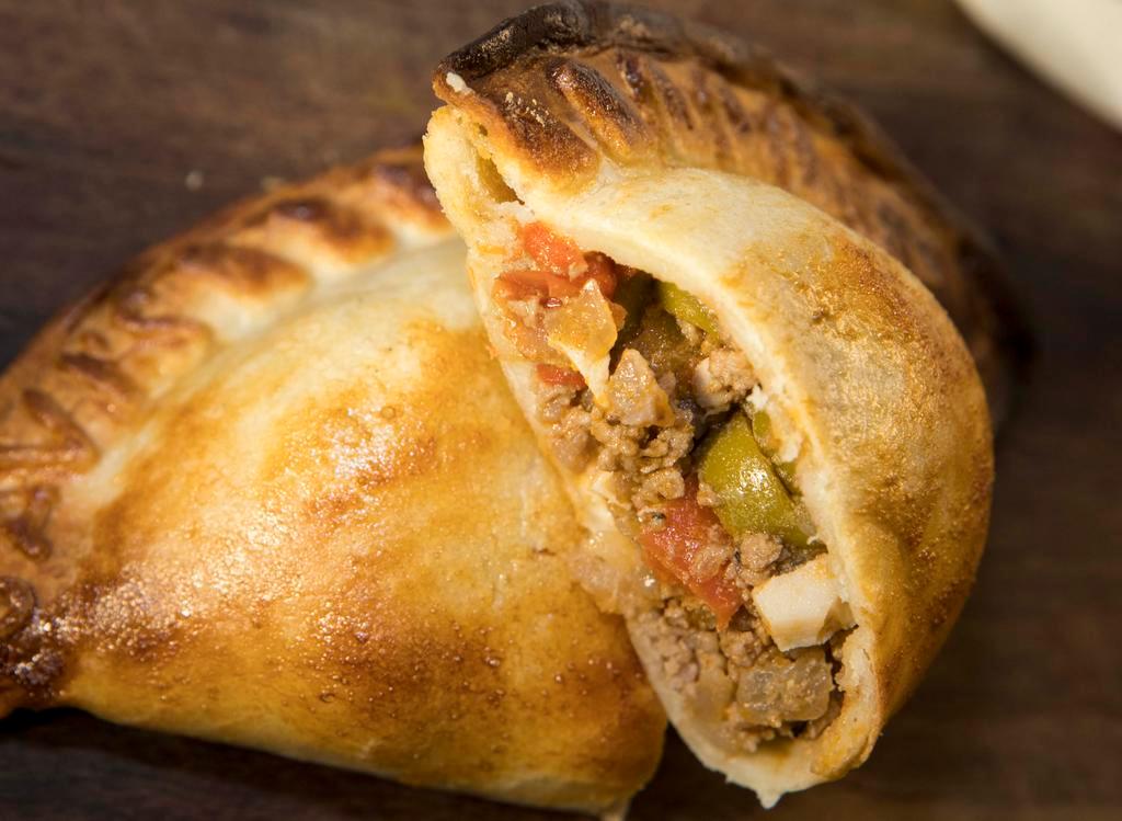 Carne (Beef) · Comes with ground beef, onions, red bell pepper, olives, and spices.