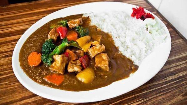 Tofu and Vegetable Curry · Fried tofu and steamed vegetables served with curry sauce, steamed rice, and house special pickle.