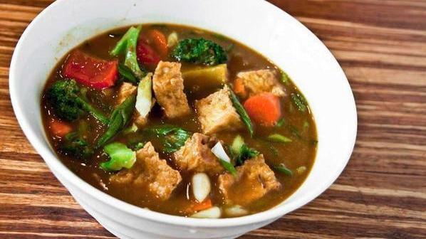 Tofu and Vegetable Noodle Soup · Served with choice of noodles.
