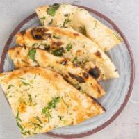 Garlic Naan by Zareen's · By Zareen's. Baked with minced garlic and cilantro sprinkle. Vegetarian. Contains gluten, da...