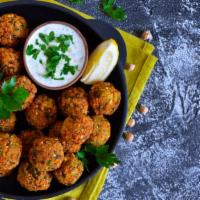 Falafels · Persian flavored falafels made with ground chickpeas, sesame seeds, spices and fresh herbs.