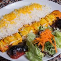 Joojeh · Classic Persian flavored boneless chicken breast with a bed of saffron white basmati rice an...