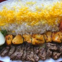 Boneless Lamb Kabob · Customer's favorite Persian lamb tenderloin beded on white saffron basmati rice and grilled ...