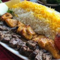 Chicken & Beef Combo · Classic boneless chicken skewer and beef kabobs topped on fresh white saffron rice and grill...