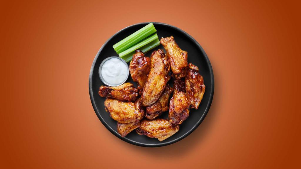 Naked Wings · Six golden fried wings succulent wings, served with a side of blue cheese or ranch.