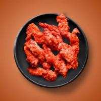 Hot Tenders · Three batter-fried chicken tenders tossed in a hḝll sauce. Served with a side of blue cheese...