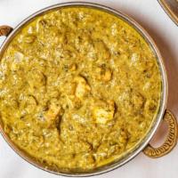 Saag Paneer · Home made cottage cheese cubes cooked with fresh spinach leaves with thick gravy of ginger, ...