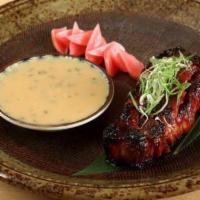 Robata Grilled Pork Belly · Topped with green onion, with pickled breakfast radish and tarragon miso on the side.