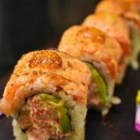 Seared Salmon & Dungeness Crab Roll · Dungeness crab, avocado and cucumber, topped with seared salmon, honey miso and schichimi pe...