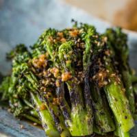 Grilled Broccolini · with Ginger Shallot Dressing and Sesame Seeds.