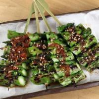 Asparagus · With wafu dressing and sesame.