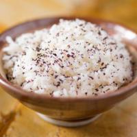 Steamed Rice · Steamed white rice topped with black sesame.