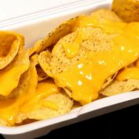 Nachos · Nachos, cheese, chili, pico de gallo, jalapenos.  Crunchy heaven!