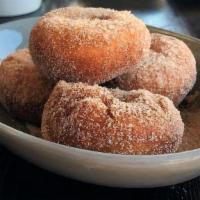 Donuts · house made warm donuts, dusted in nutmeg, cinnamon and sugar