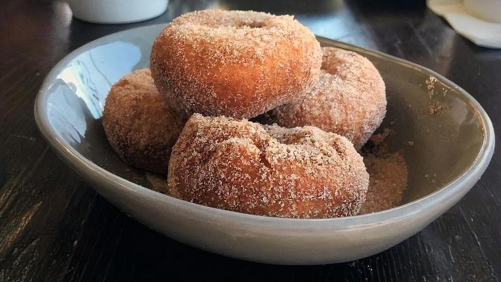 Donuts · house made warm donuts, dusted in nutmeg, cinnamon and sugar