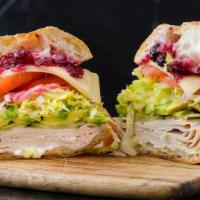 Yadi · turkey, swiss cheese, avocado, cranberry sauce, lettuce, tomato, pickles, pickled red onions...