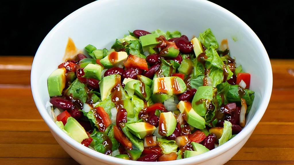 Southwest Salad · green leaf lettuce, kidney beans, avocado, onion, red and green pepper, with a cilantro lime vinaigrette & chipotle honey glaze