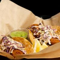 Cauliflower Tacos · house Pale battered with cabbage, dill mayo and avocado tomatillo