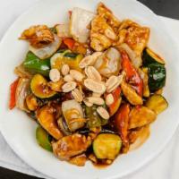 Kung Pao Chicken ( 宮保雞丁) · Chicken with mixed veggies : bell pepper, onion, carrots and celery covered with a salty gar...