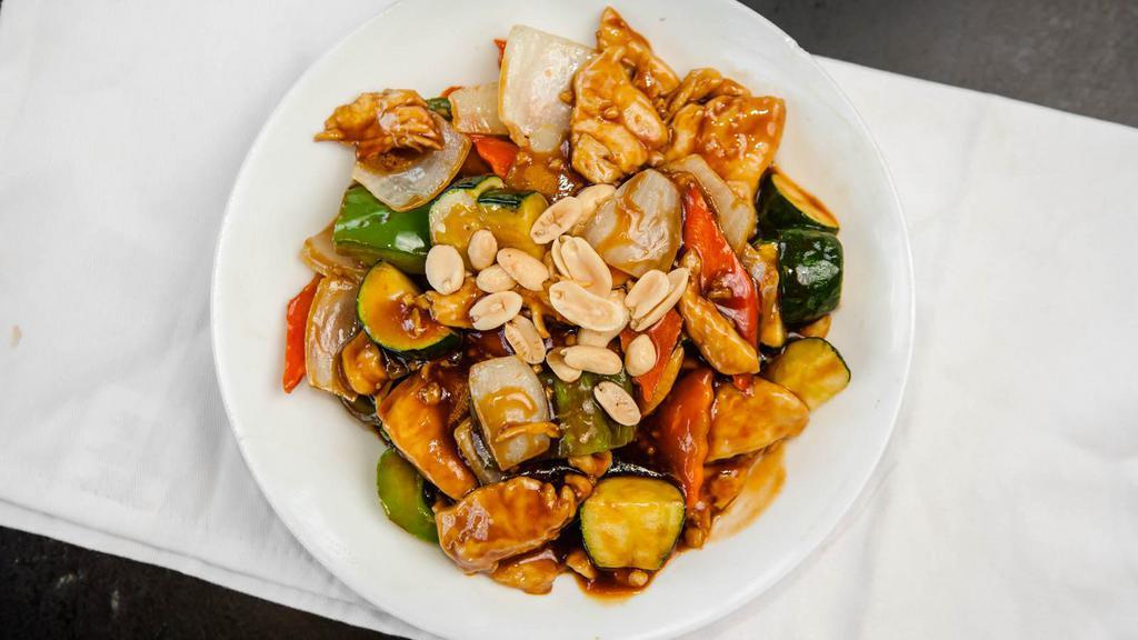Kung Pao Chicken ( 宮保雞丁) · Chicken with mixed veggies : bell pepper, onion, carrots and celery covered with a salty garlic sauce and topped with peanuts.

*Spicy*