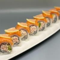 Neko Chan · Crab and Avocado Inside, Topped with fresh Ora King Salmon, and thinly sliced lemon