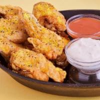 Lemon Pepper Wings · Classic Bone-In Chicken Wings, dressed up in our classic Lemon Pepper rub.