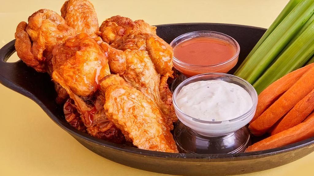 Mango Habañero Wings · Classic Bone-In Wings, this delectable sauce is sweet with a habanero spiced kick for that perfect balance.