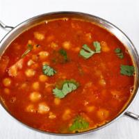 Chana Masala · Vegan. Chick peas cooked in a thick house curry sauce.