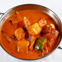 Kadai Paneer · Vegetarian. Cubes of Indian cheese cooked in a creamy curry with bell pepper and onions.