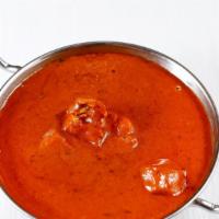 Chicken Tikka Masala · Boneless chicken breast cooked in a creamy tomato curry sauce.