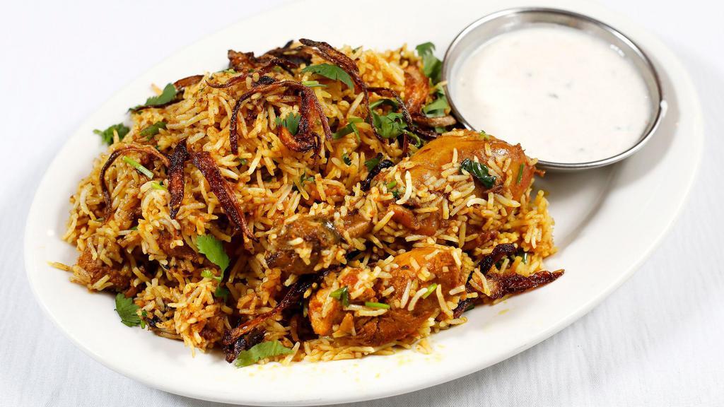 Chicken Biryani (Bone-In) · Biryani dishes are made from highly seasoned rice with a meat or mixed vegetables. all biryanis are served with a side of raita (indian yogurt).