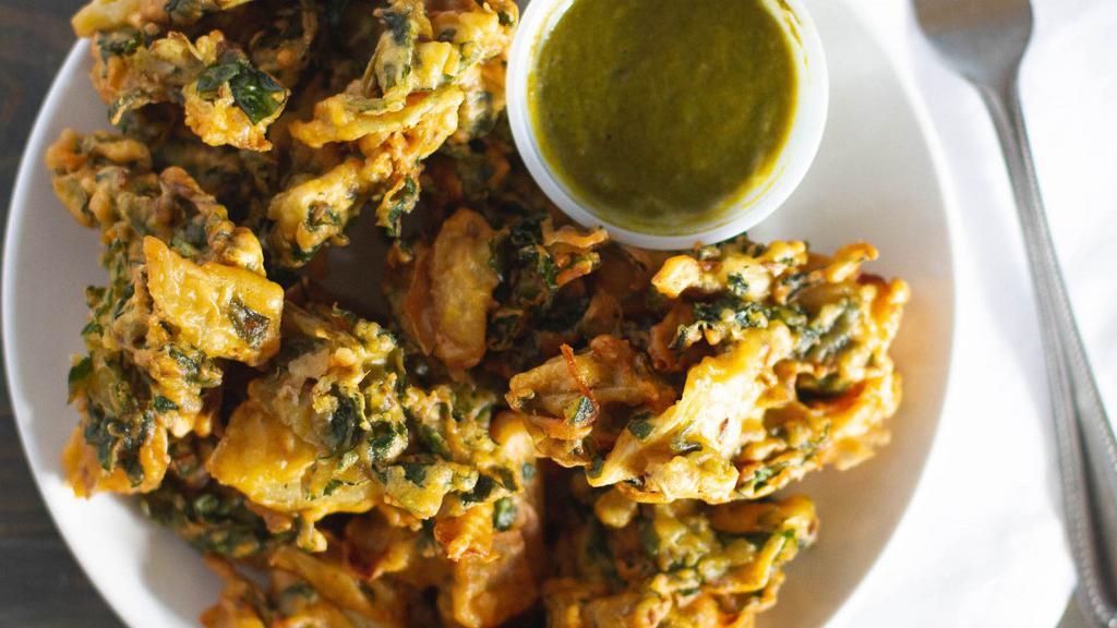 Pakora · All pakoras are dipped in mildly spiced in chic pea batter mixed with garlic, ginger, and spices.