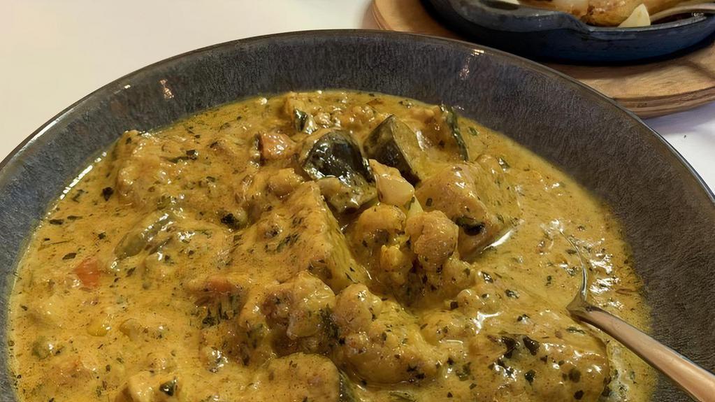 Chicken Korma · Organic chicken  with assorted vege served in saffron curry creamy sauce. Must try.