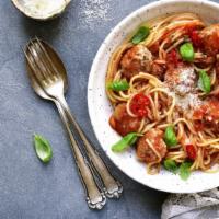 Spaghetti & Meatballs · Fresh meatballs made with beef, bell peppers smothered with our tomato sauce on a bed of hom...