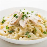 Alfredo Pasta with Chicken · Hearty grilled chicken and house-made creamy Alfredo sauce served over a bed fresh pasta.